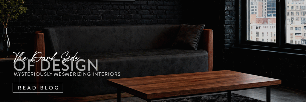 Sentta blog banner titled 'The Dark Side of Design - Mysteriously Mesmerizing Interiors', featuring a moody, sophisticated living room with a dark velvet sofa and a wooden coffee table set against a black brick wall.