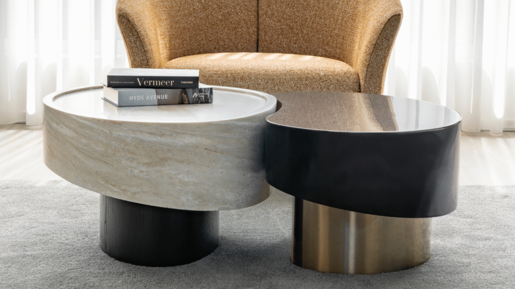 Alma Elegance Coffee Tables by Sentta featuring interlocking organic shapes with a stone top and contrasting wooden base.